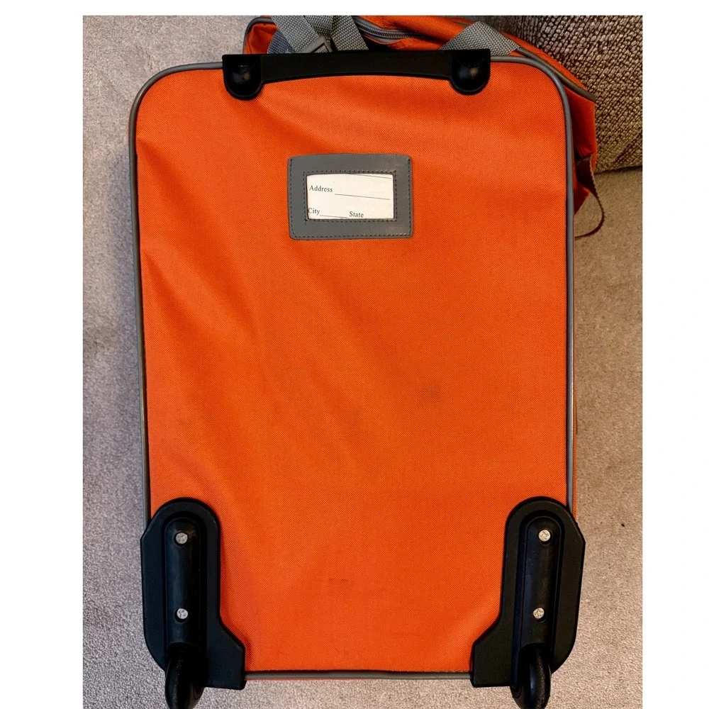 NEW Travel Select Travelers Choice 2 piece Luggage Carry On Orange Rolling Bag